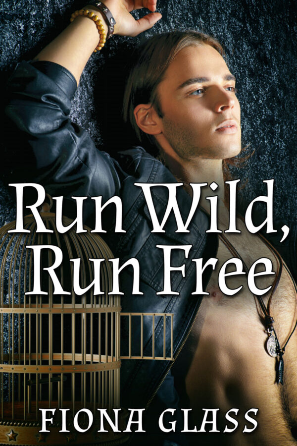 Cover - Run Wild, Run Free by Fiona Glass - Foreground, bottom left: a golden birdcage with its door ajar; in background, a handsome young white man with longish dark hair and blue eyes, laying on his back and staring off into the distance on a dark, pavement-like surface, wearing a black leather jacket with a leather strap and silver medallion on is bare, slightly hairy chest